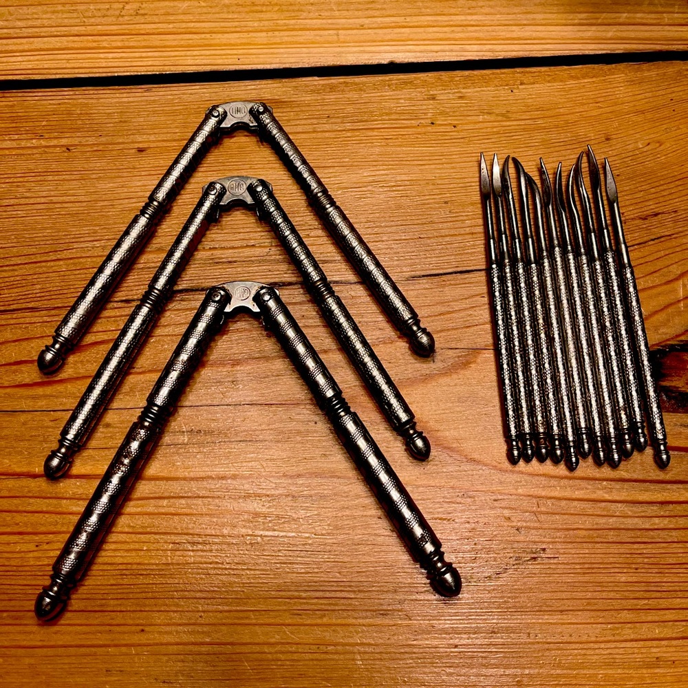 Vintage HMO Nut crackers (3) and 11 picks (all 14 are stainless steel)